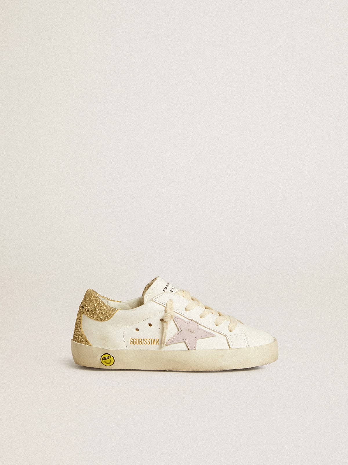 Super-Star Young with purple leather star and glitter on the heel