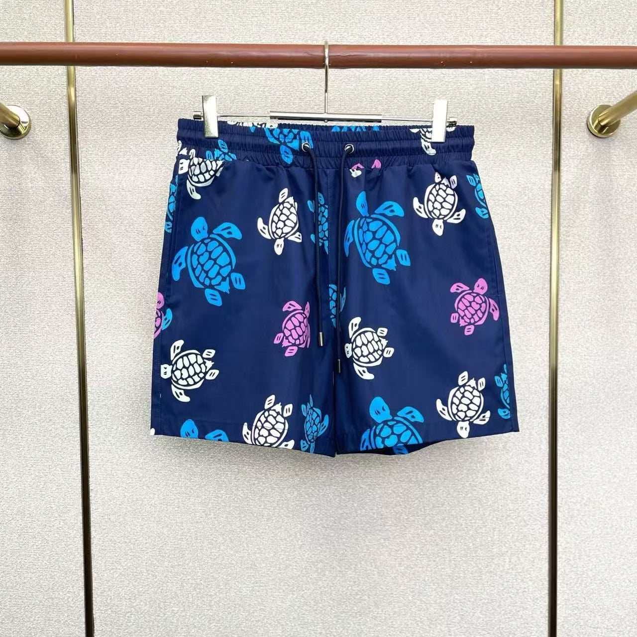 Badehose mit mehrfarbigem Schildkröten-Print Königsblau