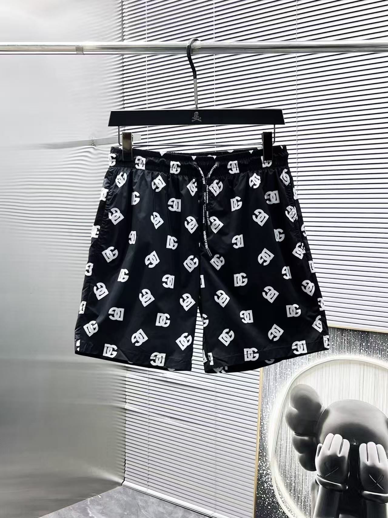 Badehose mit Monogramm-Muster Schwarz