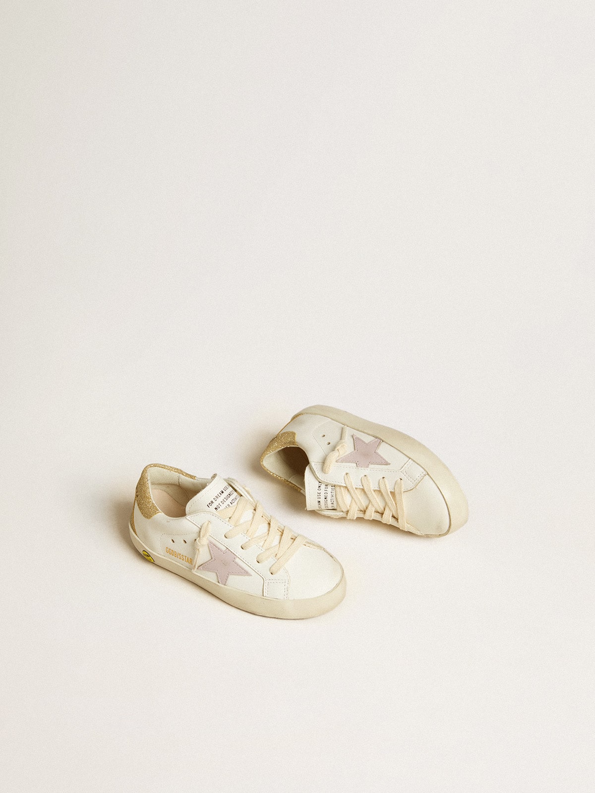 Super-Star Young with purple leather star and glitter on the heel