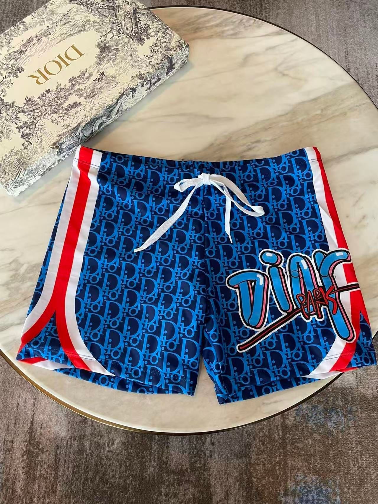 Badehose mit Oblique Graffiti-Print Blau