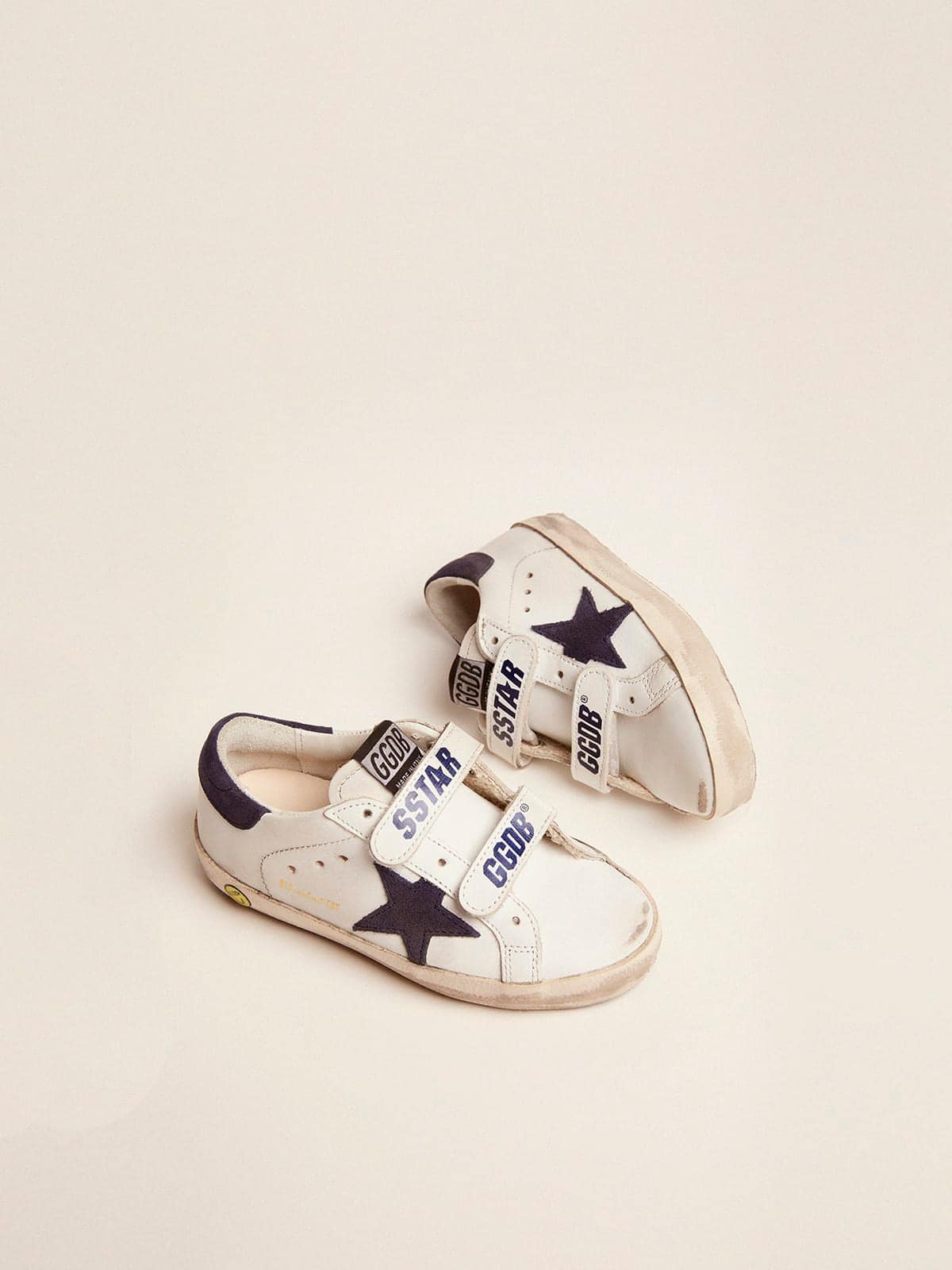 Old School Young in white leather with star and heel detail in blue suede