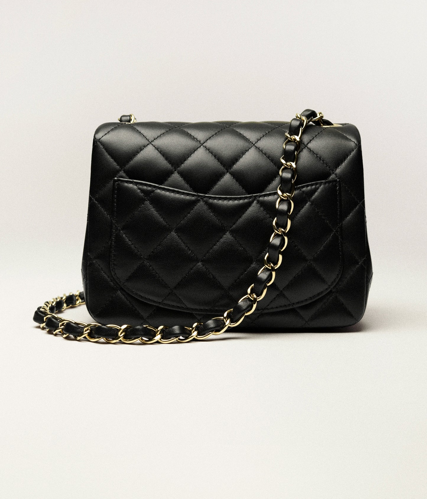 Classic mini bag in black with gold-colored metallic effect