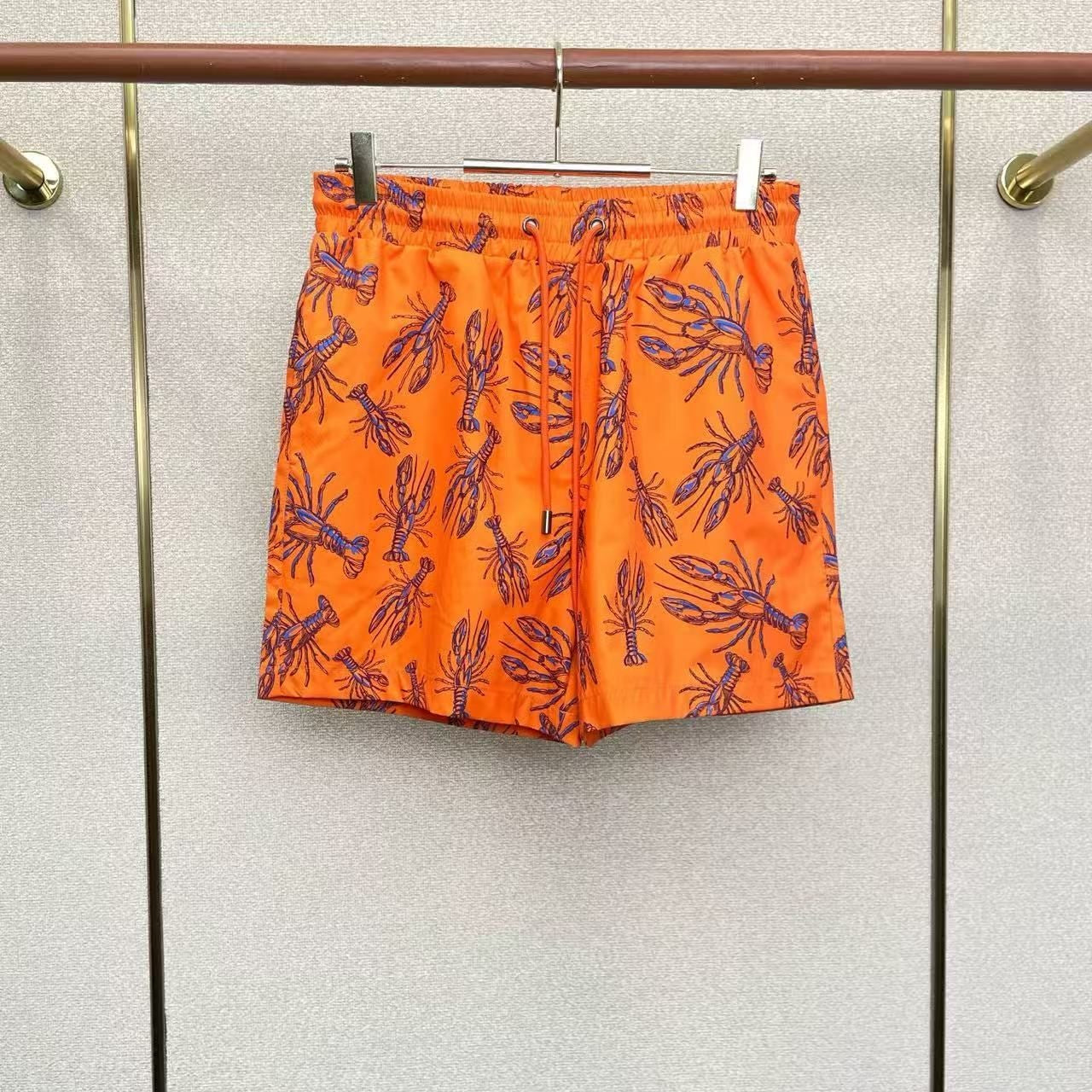 Badehose mit Hummer-Print Orange