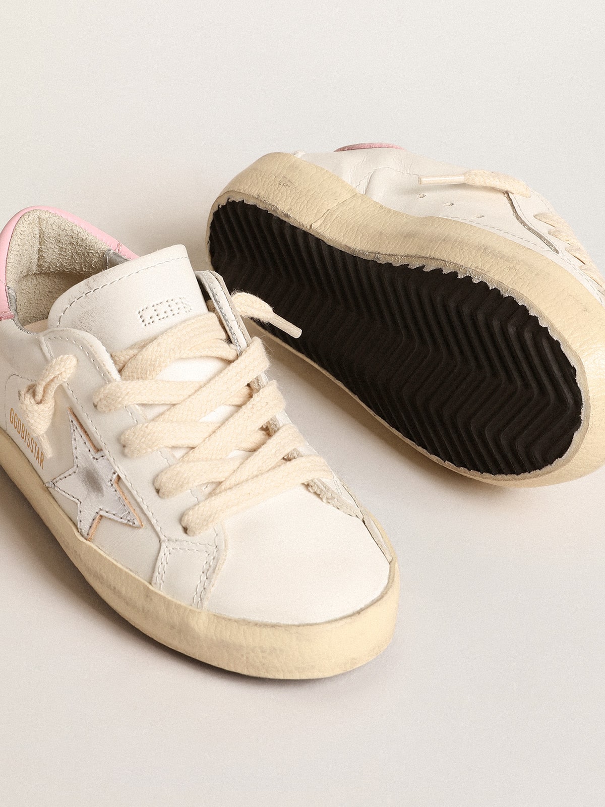 Super-Star Young with silver leather star and pink heel