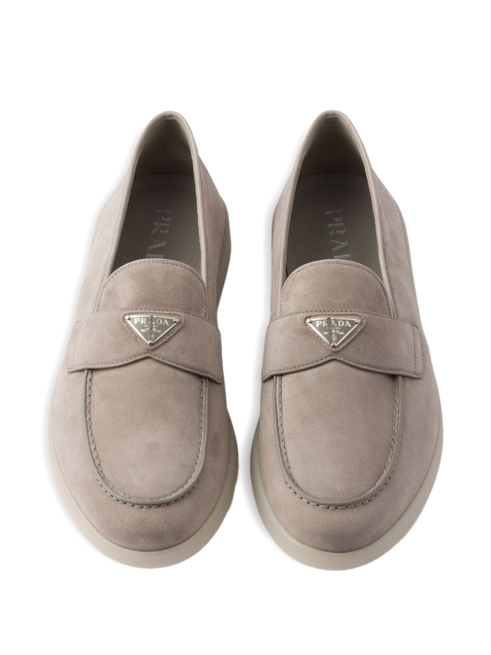 Slipper aus Veloursleder in Beige mit Dreieckslogo