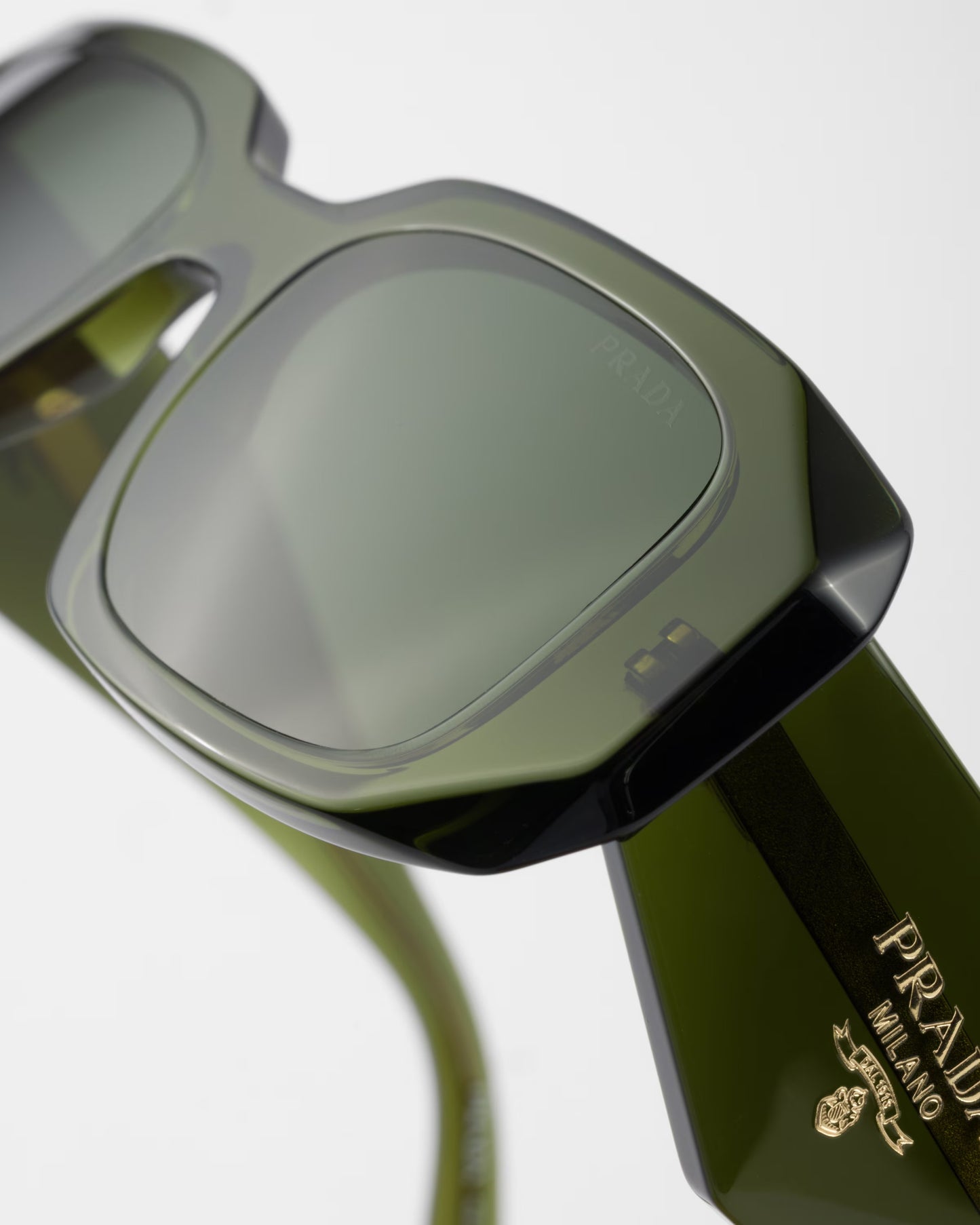 Geometric PP sunglasses with forest green lenses