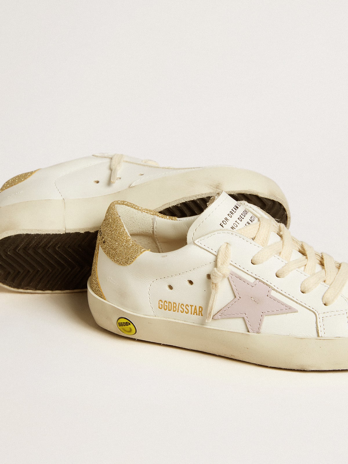 Super-Star Young with purple leather star and glitter on the heel