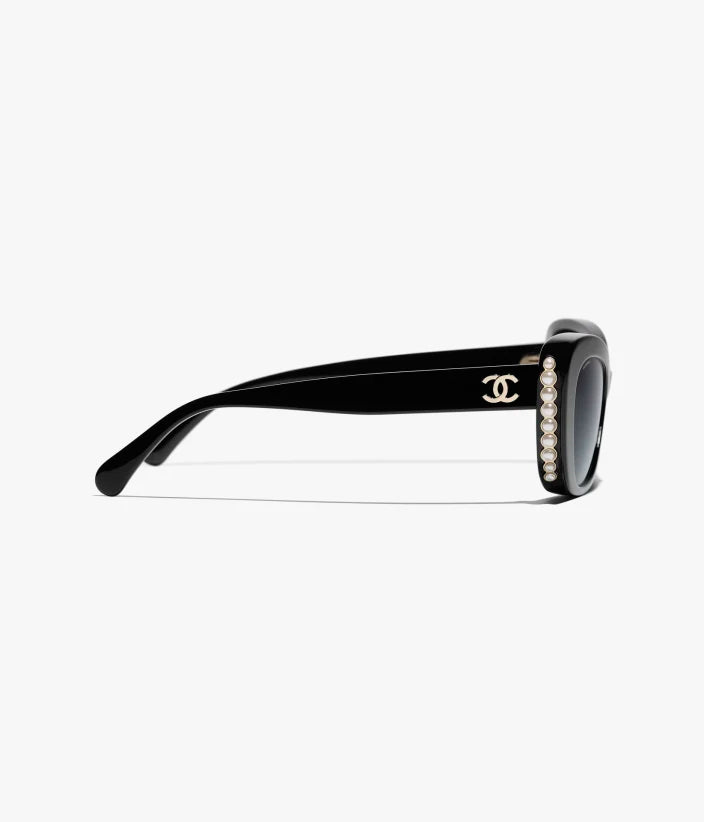 Cat-Eye-Sonnenbrille aus Acetat, schwarzem Perlmuttglas und Gold mit grau verlaufenden Gläsern