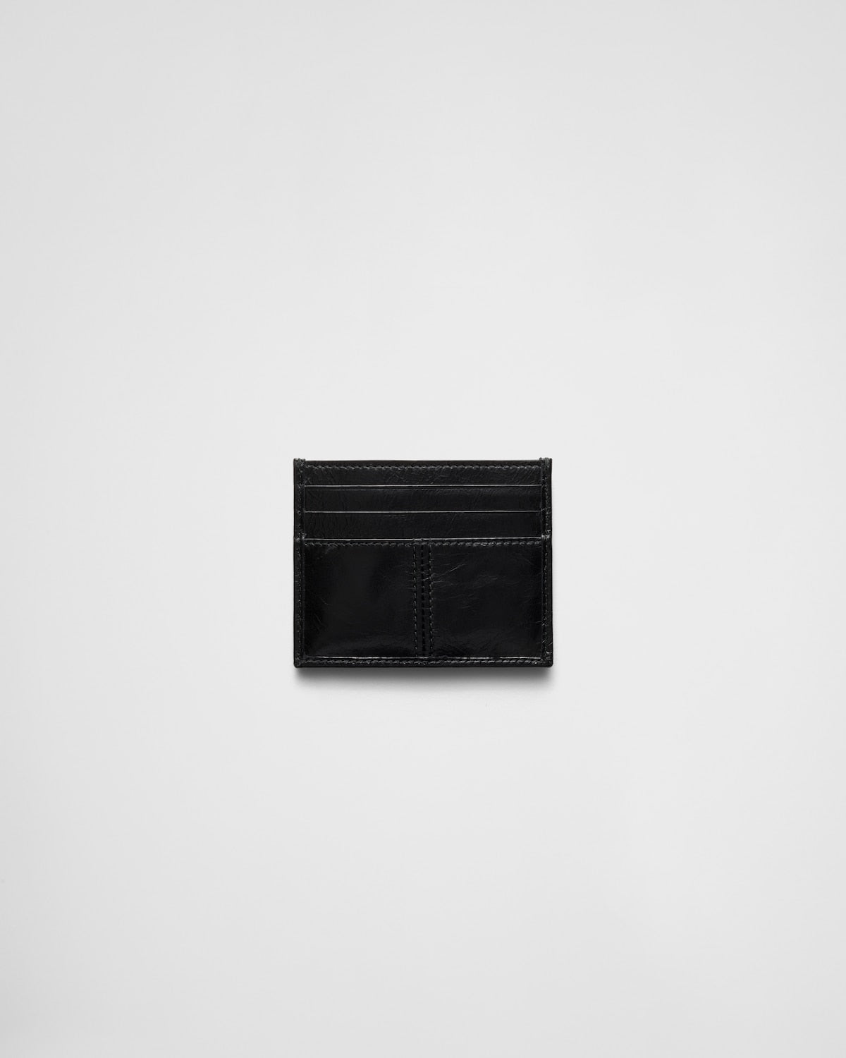 Black leather card holder with triangular logo