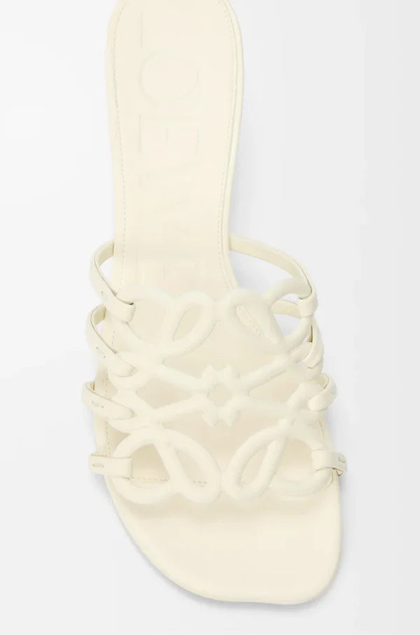 Slide Anagram Petal with heel in soft white leather