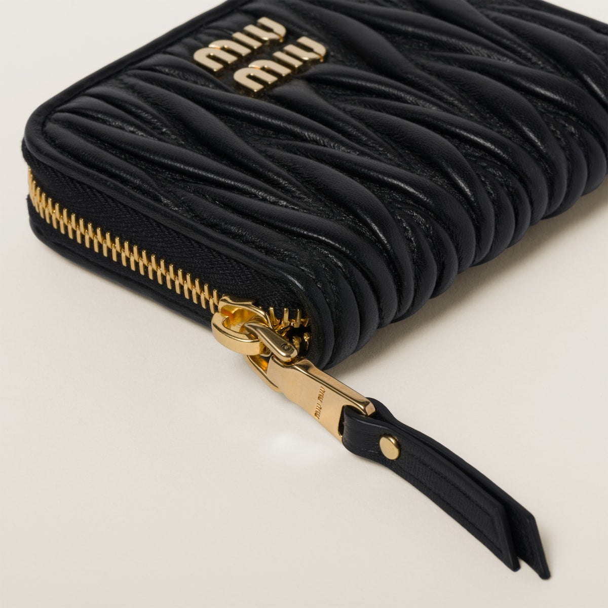 Coin case made of black matelassed nappa leather