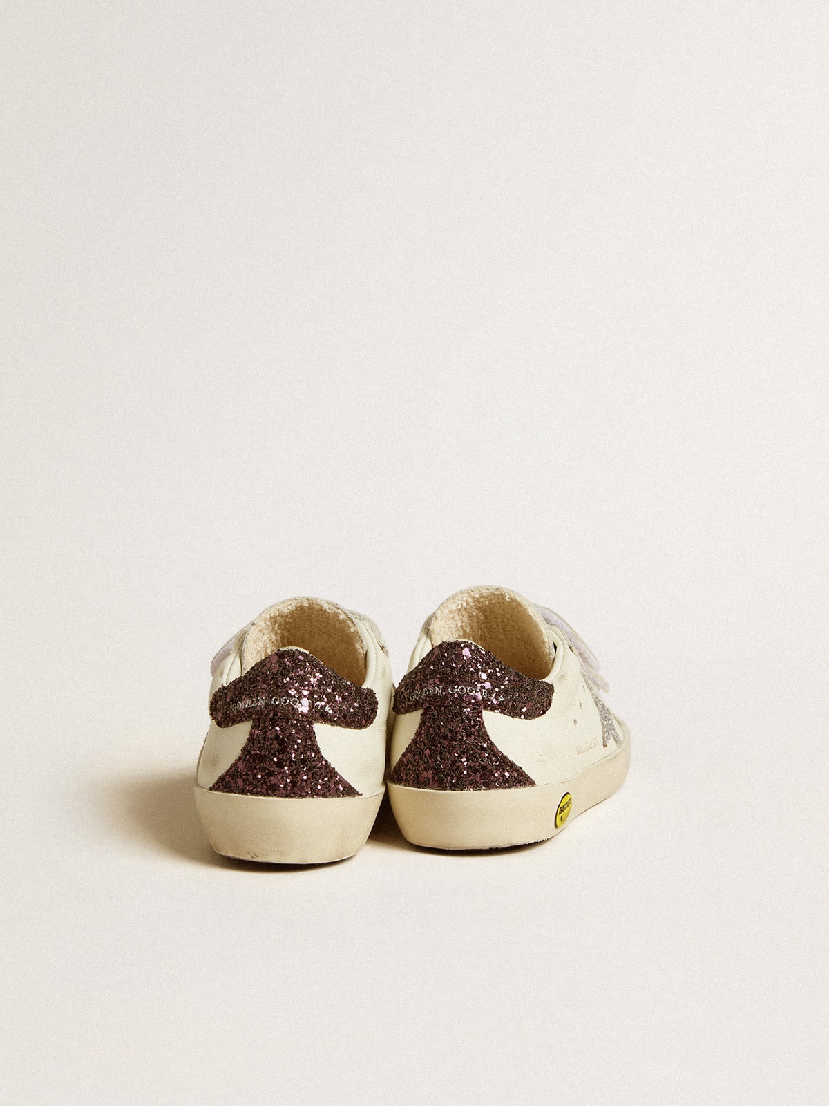 Old School Young with silver glitter star and glitter on the heel
