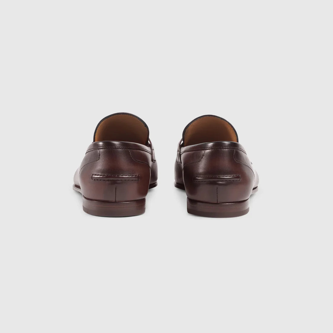 Men's GG Jordaan moccasin in dark brown leather with gold buckle