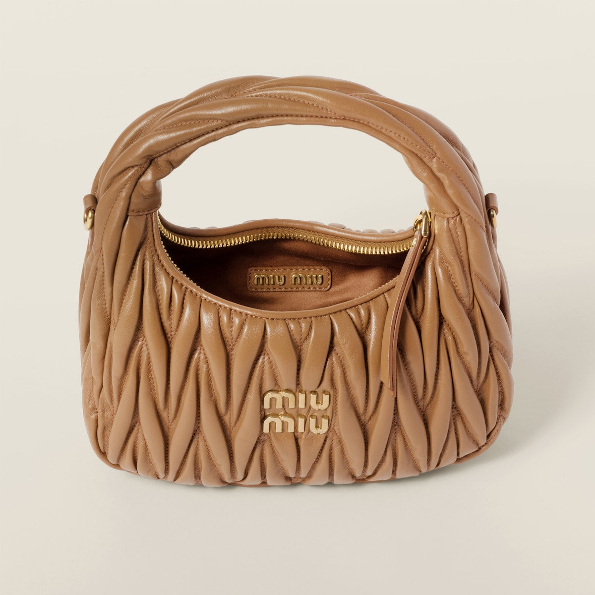 Hobo bag Wander small made of matelassed nappa leather in caramel