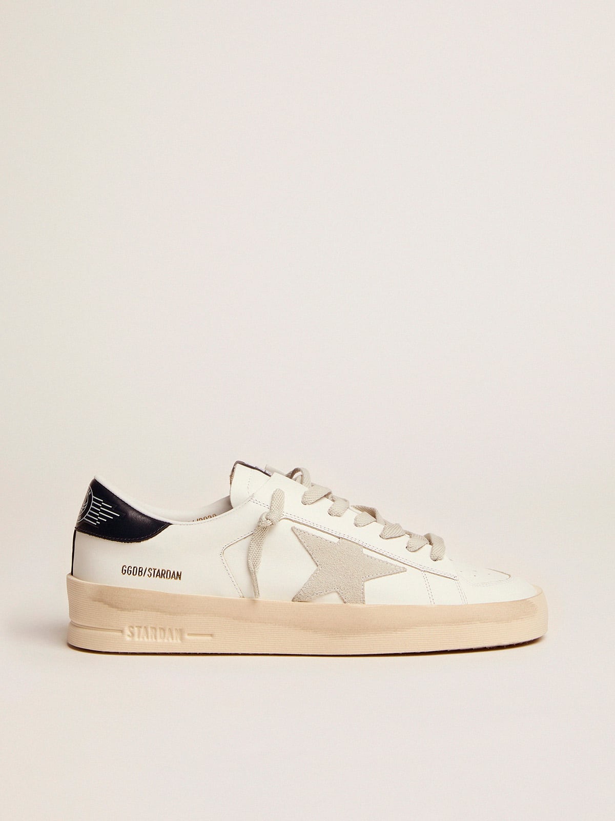 Stardan with star in ice grey suede and navy blue heel