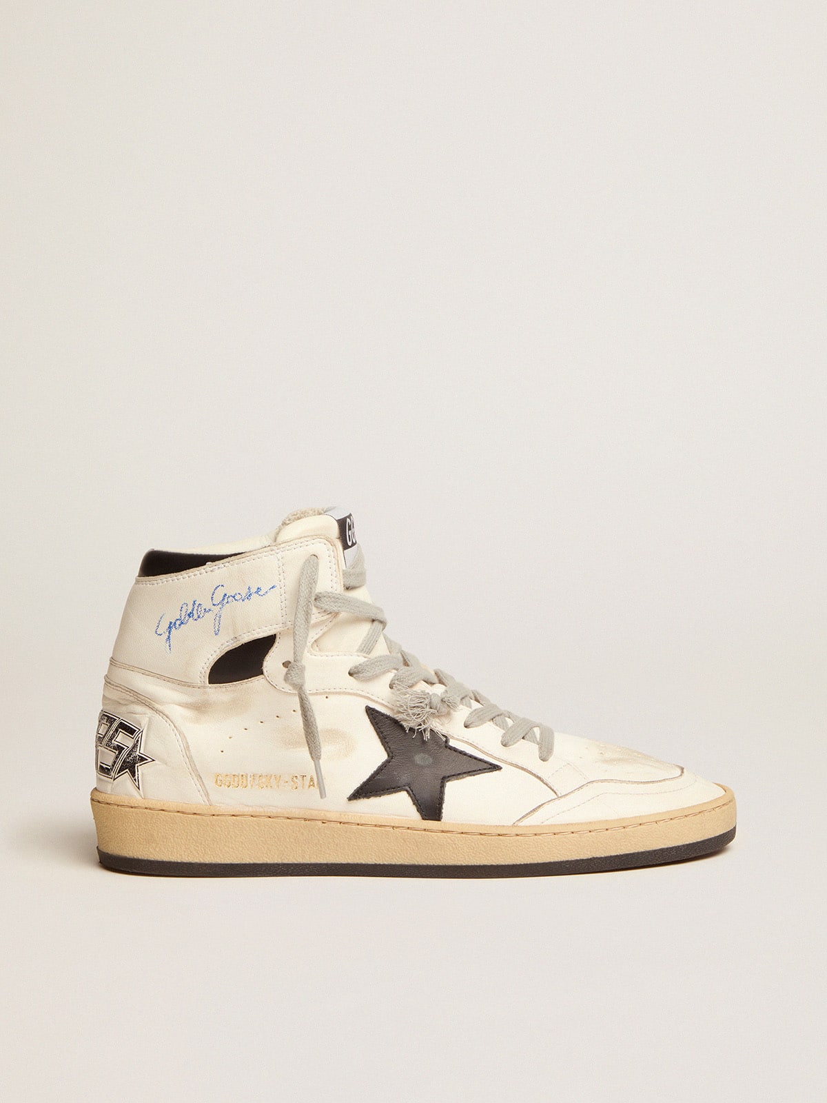 Sky-Star made of white leather with black leather star