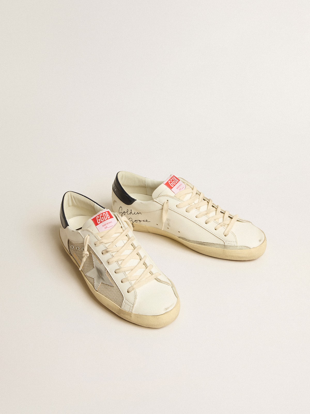 Super-Star LTD in mesh and leather with silver star and blue heel