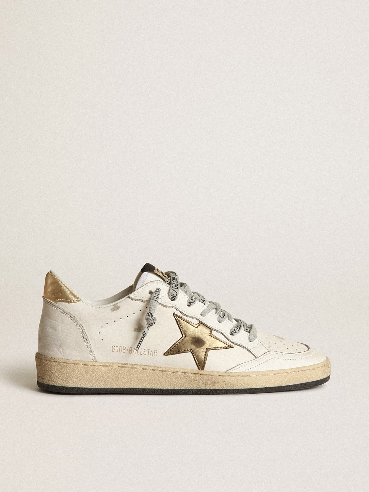 Star and heel in gold