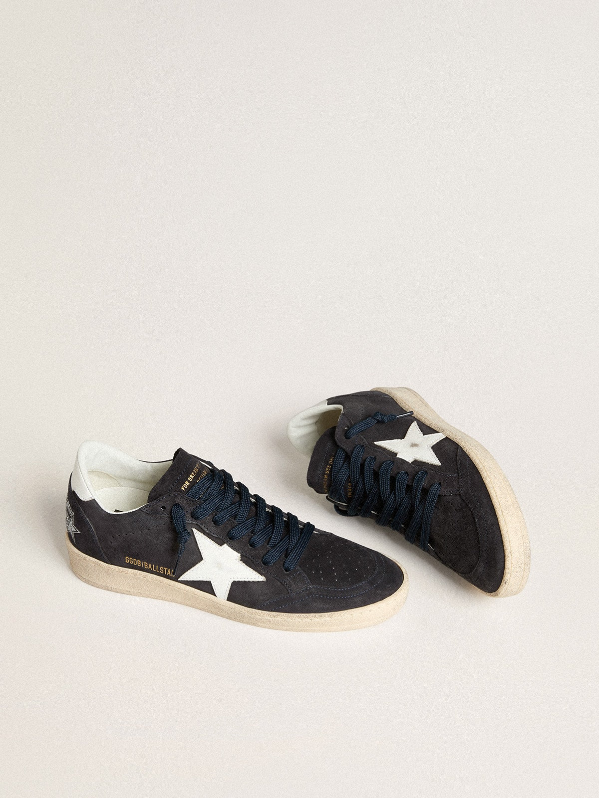 Dark blue suede with star and leather heel detail