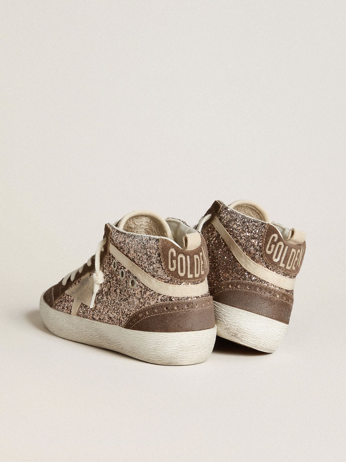 Glitter mid-star with pearl-colored suede star and brown suede inserts