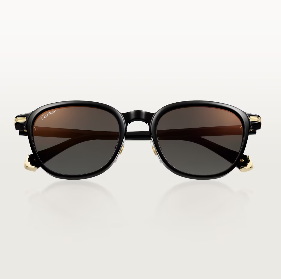 Runde Première de CT Sonnenbrille aus schwarzem Acetat mit glatter Goldoberfläche und grauen Gläsern mit goldenem Spiegeleffekt