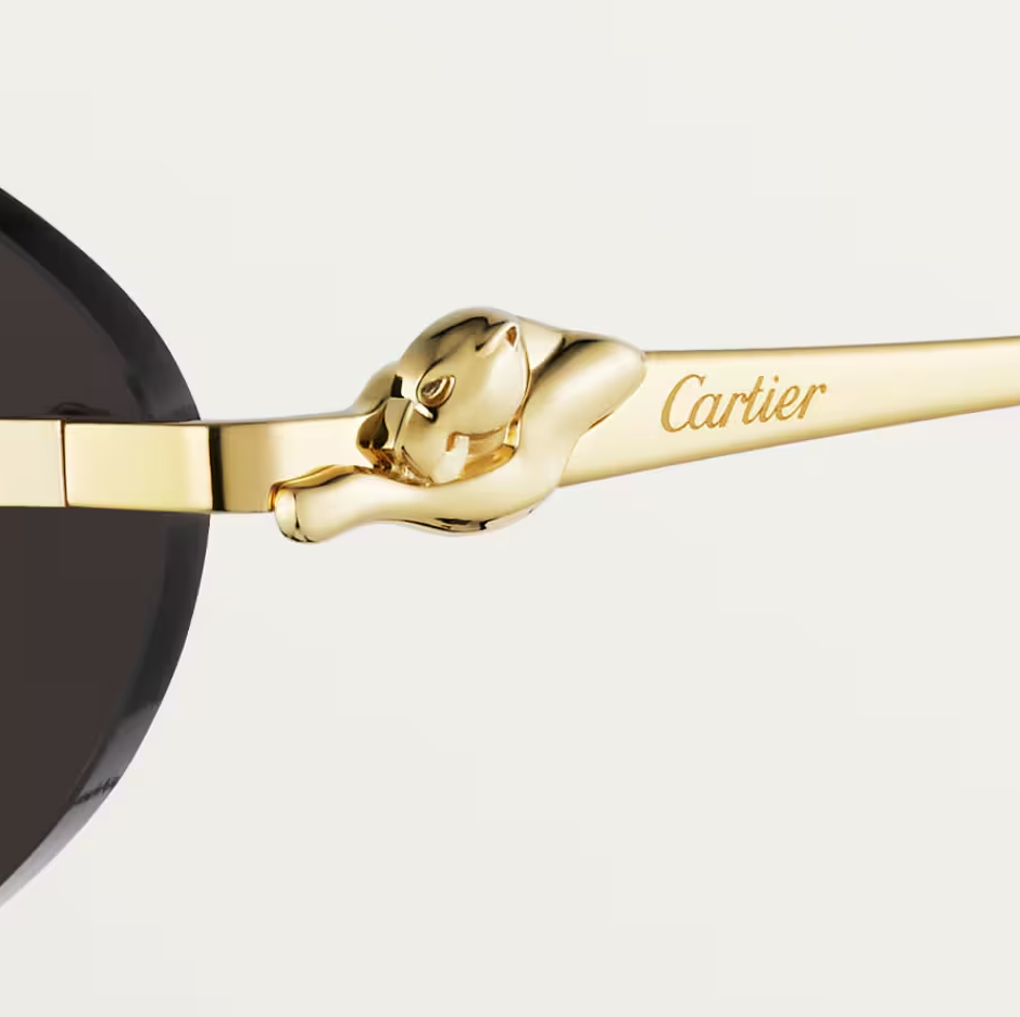 Ovale Panthère de CT Sonnenbrille mit grauen Gläsern und goldenem Spiegeleffekt