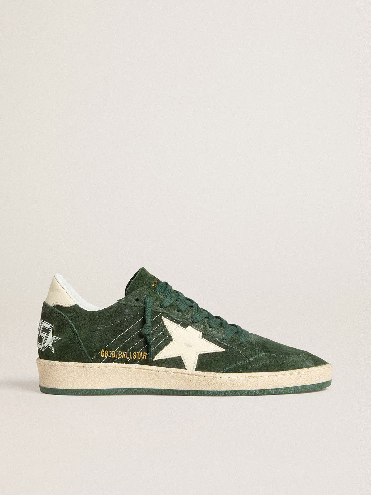 Green suede with star and white leather heel