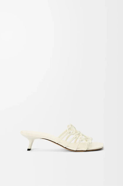 Slide Anagram Petal with heel in soft white leather