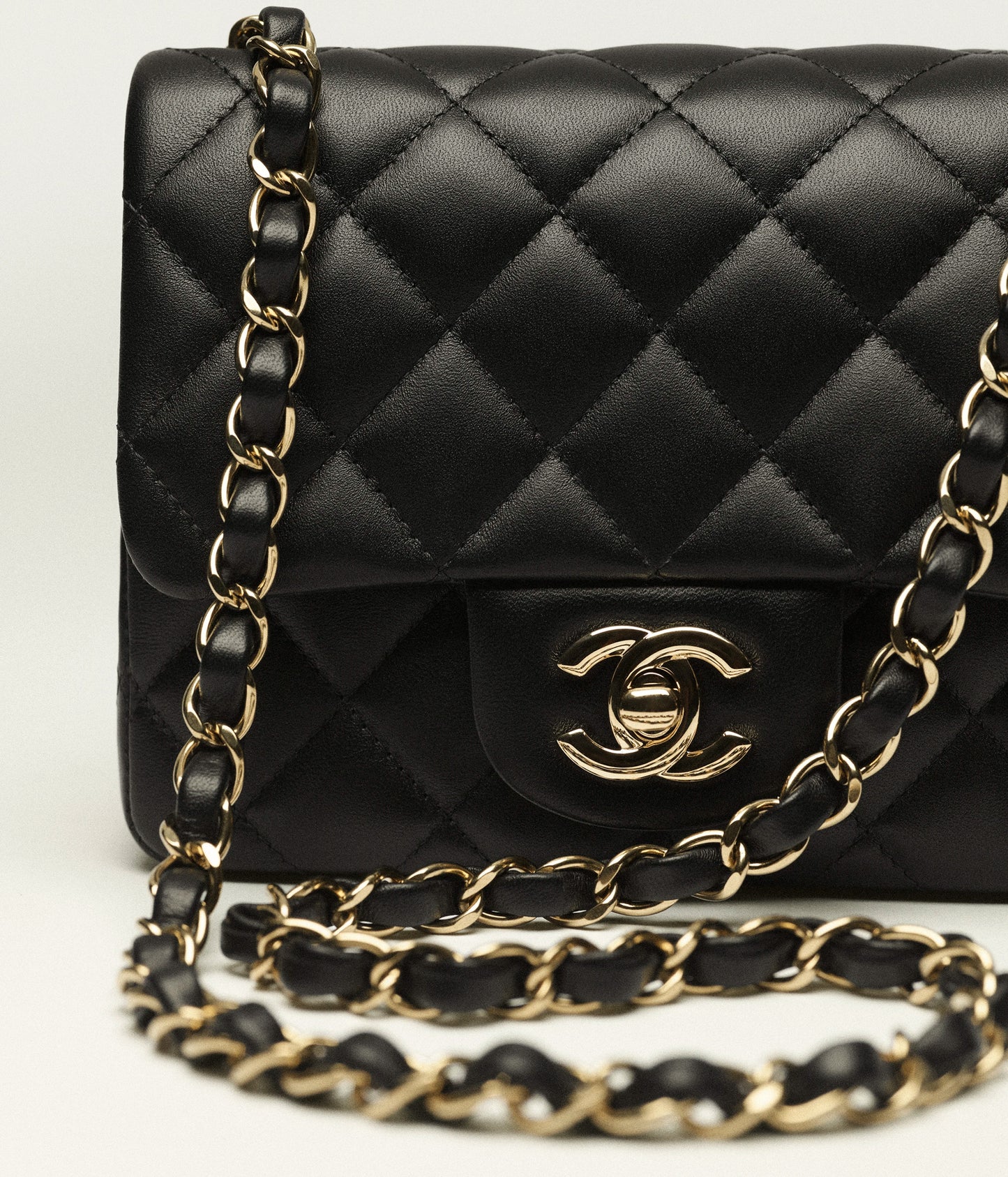Classic mini bag in black with gold-colored metallic effect