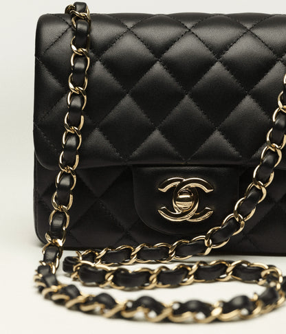 Classic mini bag in black with gold-colored metallic effect