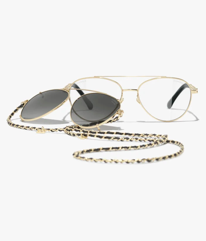 Pilot-Sonnenbrille aus hellgoldfarbenem Metall und Kalbsleder mit grauen Gläsern