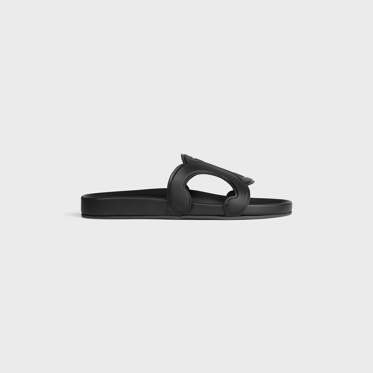 Triomphe slides in vegetable-tanned calfskin in Black