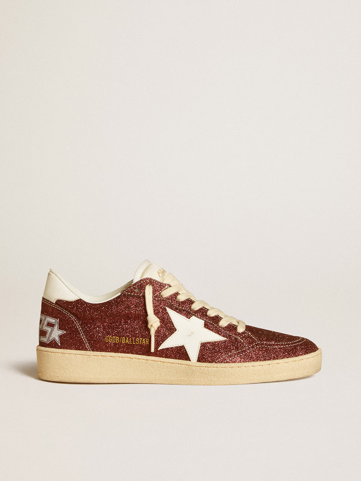 Bordeaux glitter with a star and white leather heel counter