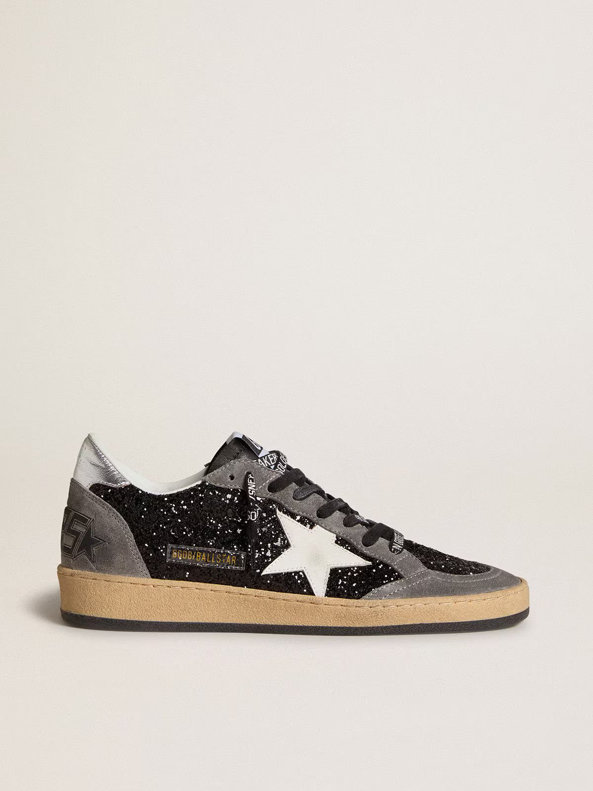 Glitter with leather star and metallic leather on the heel