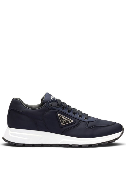 Low sneakers with blue logo print