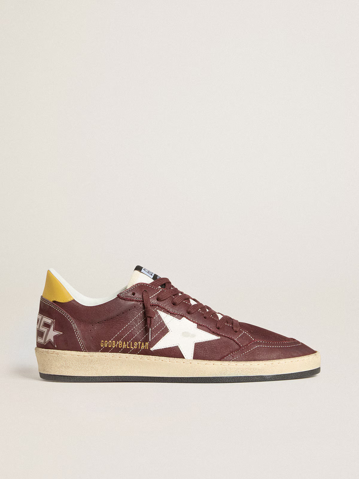 Chocolate brown nubuck with star and heel in leather
