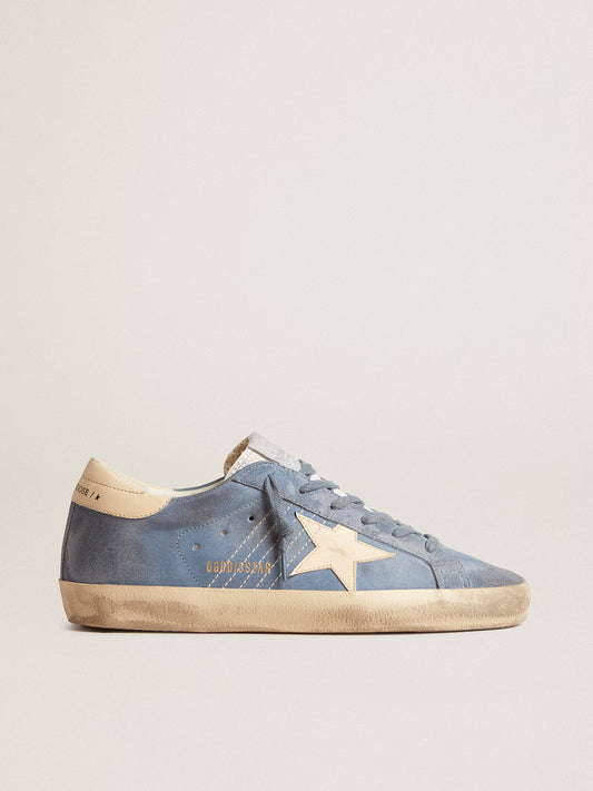 Azure blue suede with a star and heel in beige leather