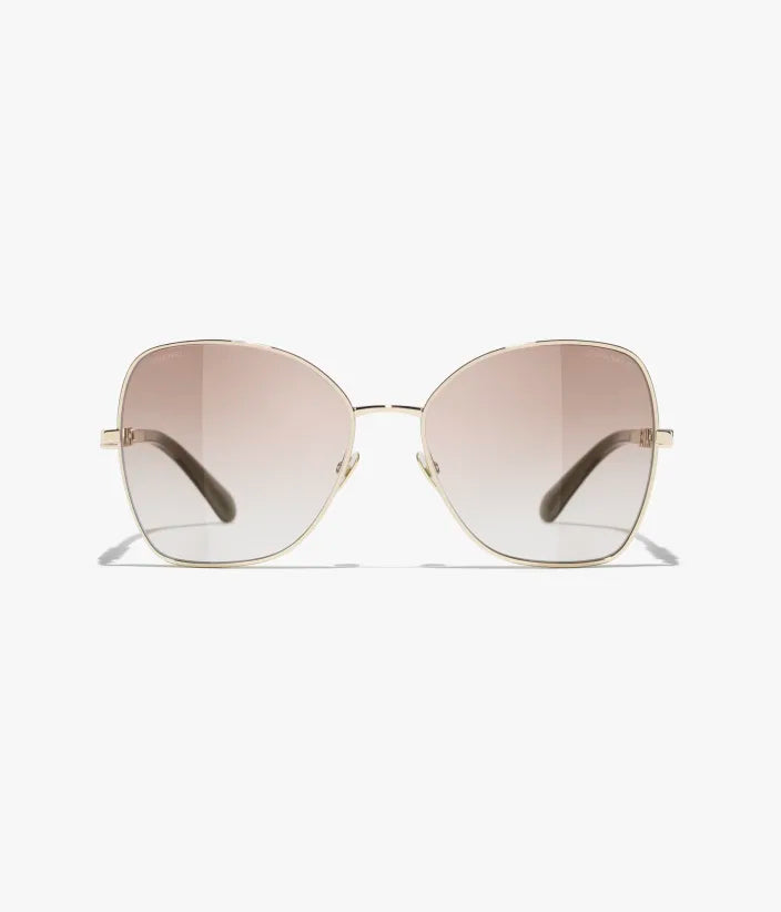 Butterfly-Sonnenbrille mit hellgoldfarbenem Metallgestell und beige verlaufenden Gläsern