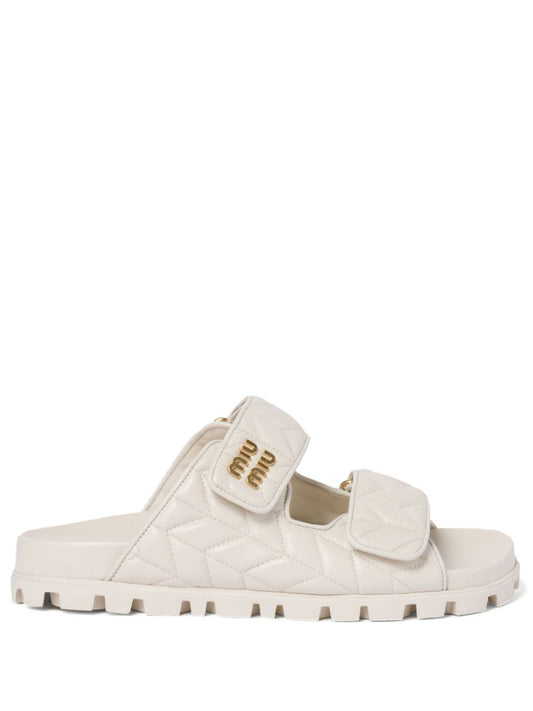 Padded slides made of white nappa leather