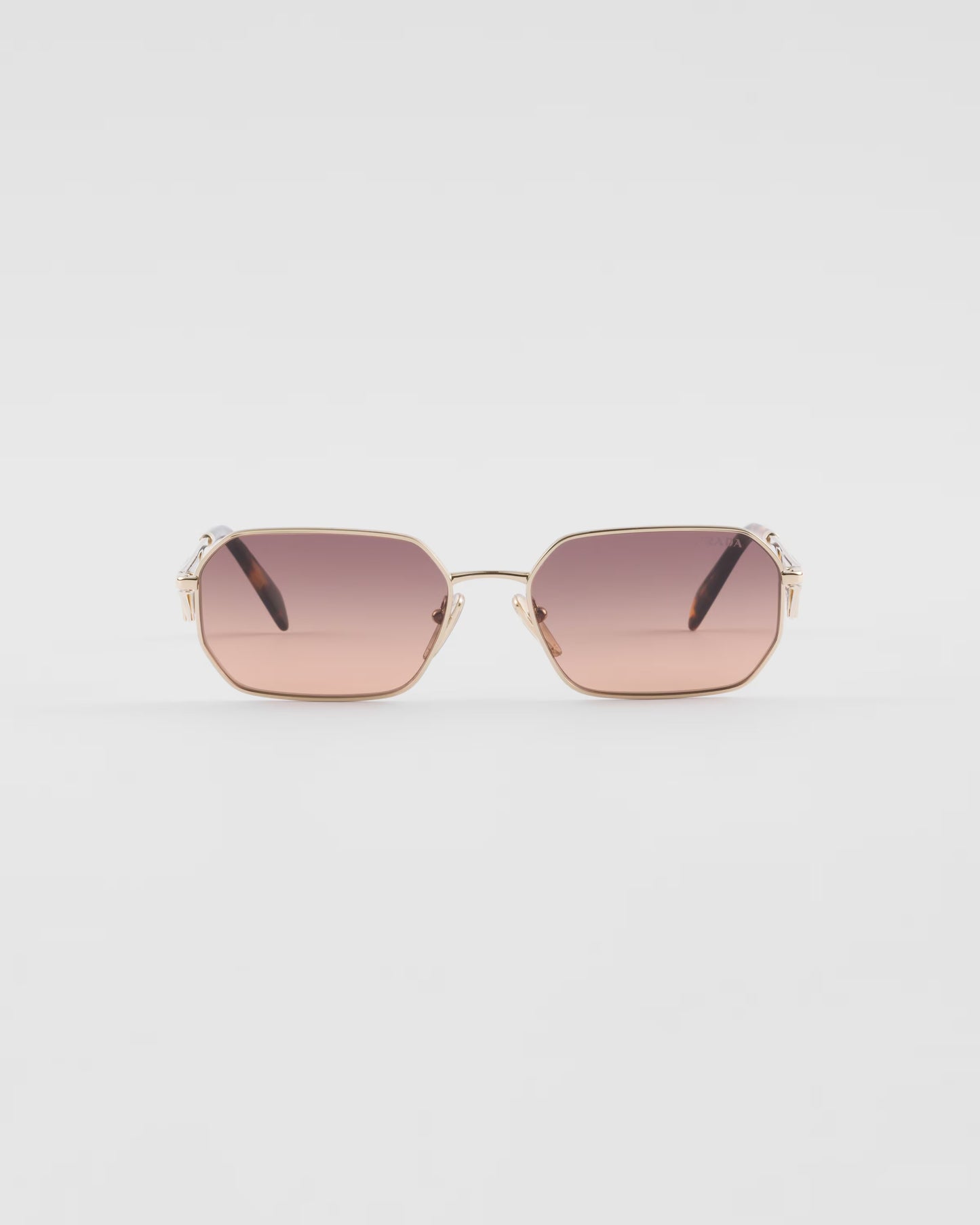 Sonnenbrille mit Dreieckslogo und karamellfarbenen Verlaufsgläsern