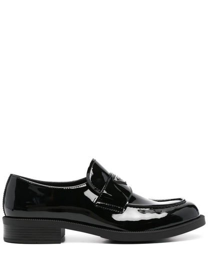 Black leather slipper with triangle logo