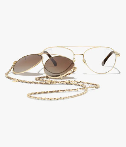 Pilot-Sonnenbrille aus hellgoldfarbenem Metall und Kalbsleder mit braunen Gläsern