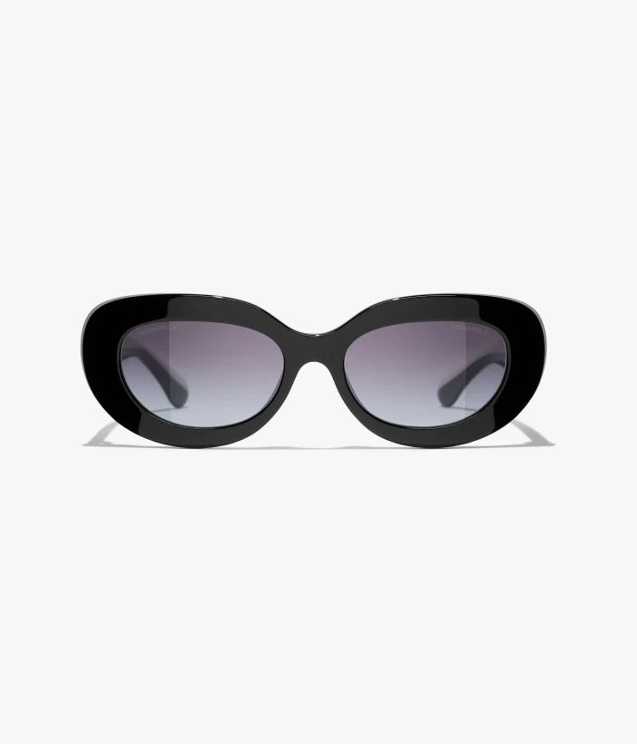 Zweifarbige ovale Sonnenbrille aus schwarzem Acetat mit grauen Gläsern