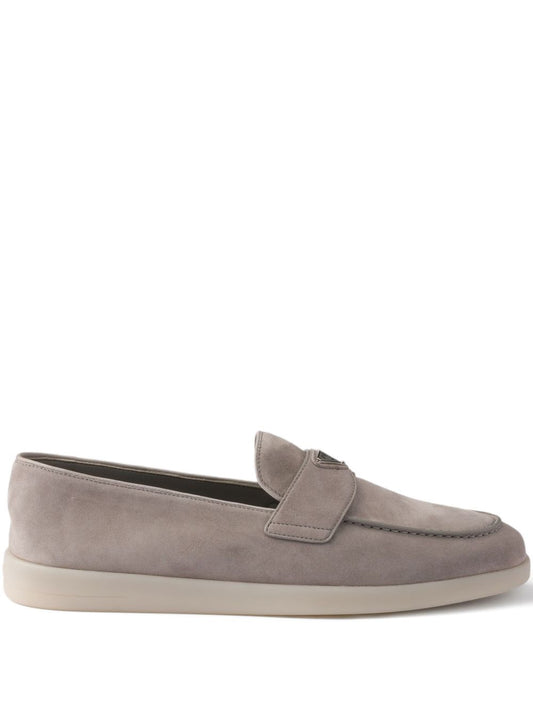 Beige suede slipper with triangle logo