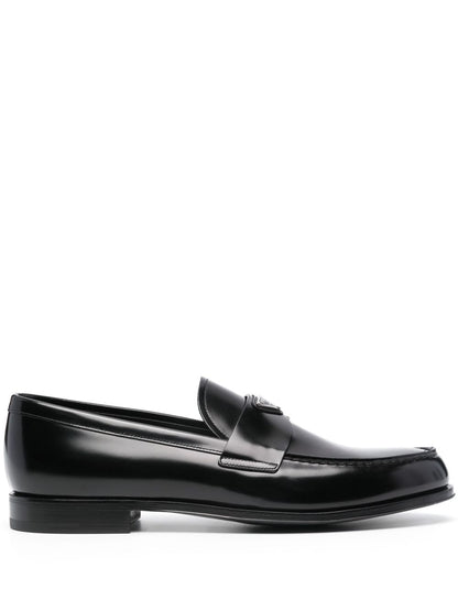 Leather moccasins with enameled triangle logo