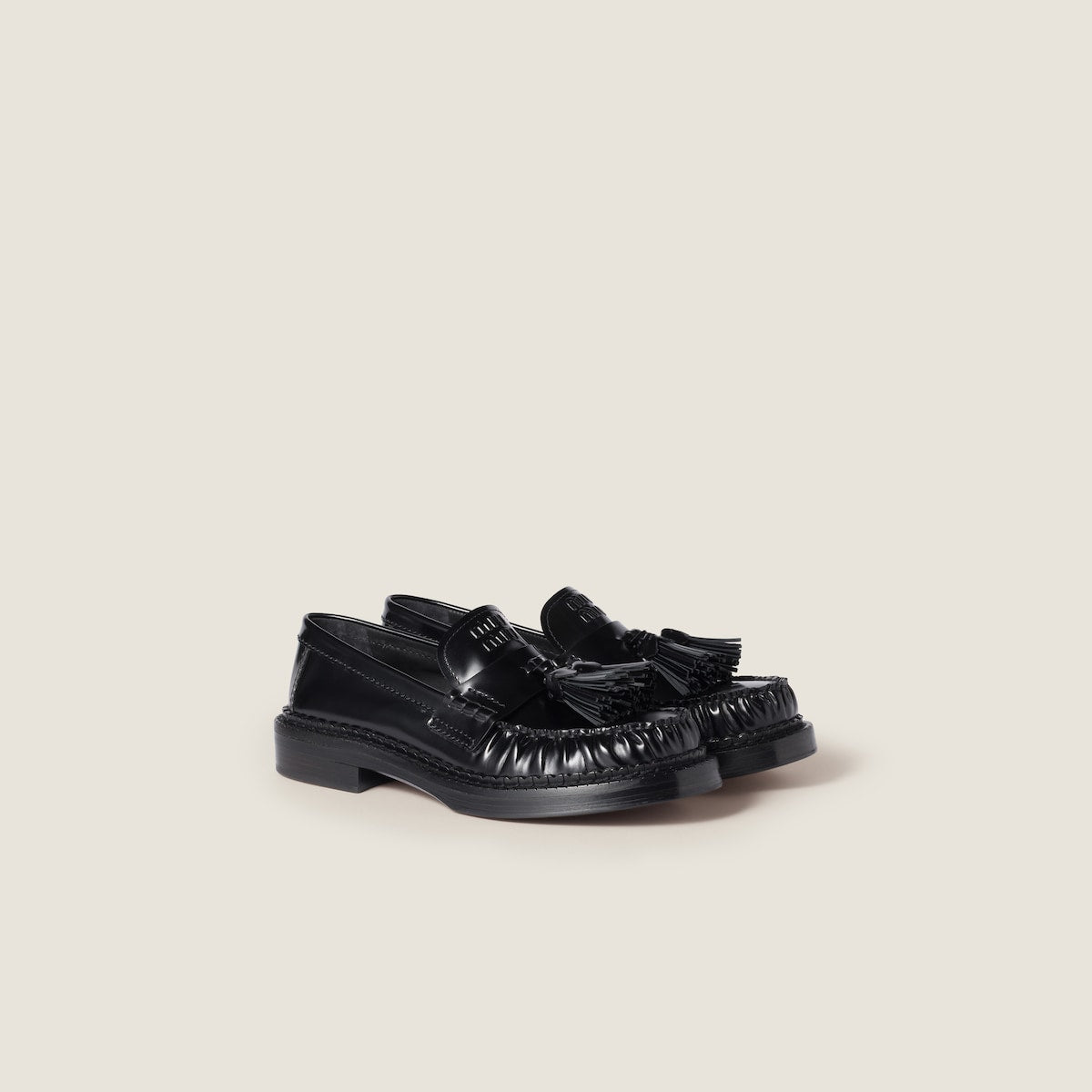 Black brushed leather loafers with tassels