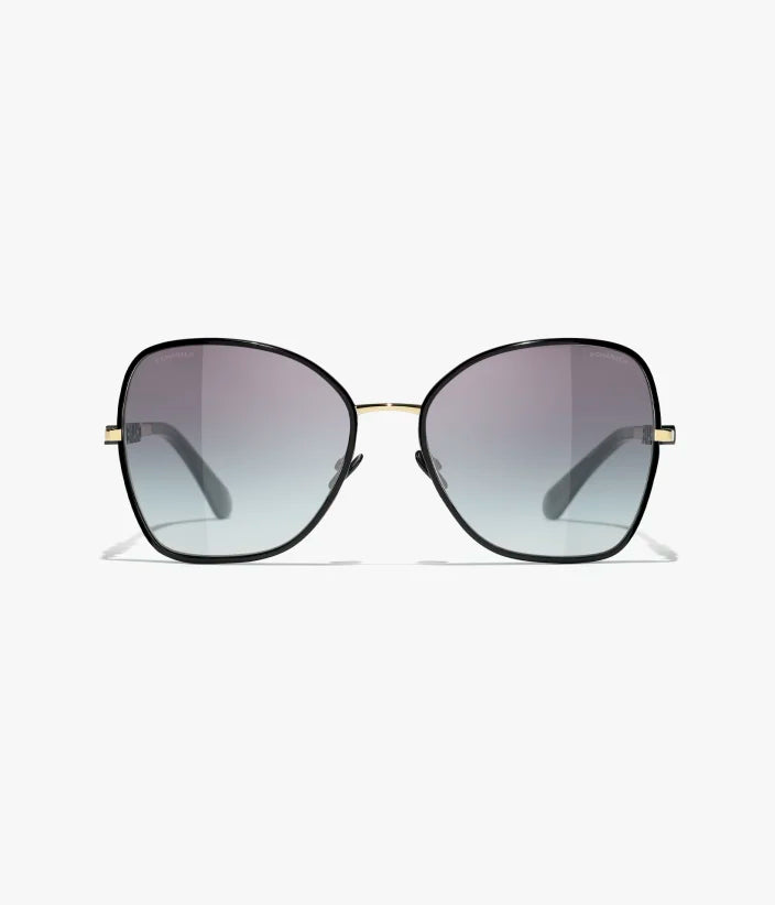 Butterfly-Sonnenbrille mit gold- und schwarzfarbenem Metallgestell und grau verlaufenden Gläsern