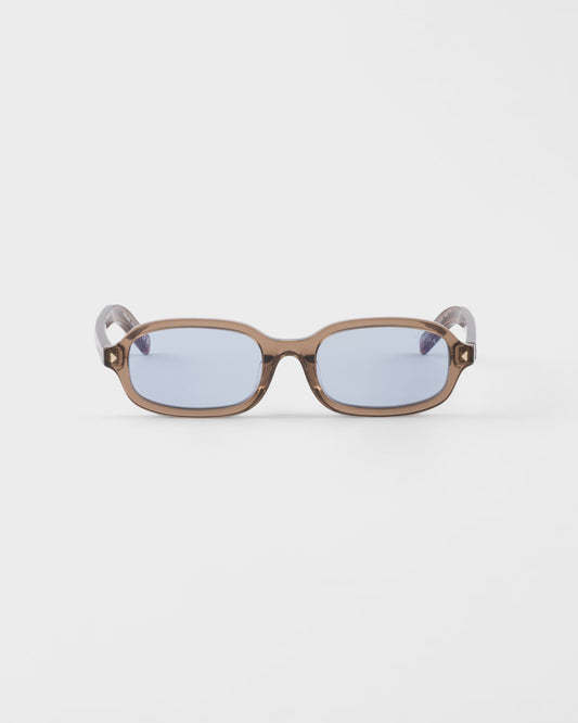 Sunglasses with iconic metal plaque and Crystal Ultraviolet lenses