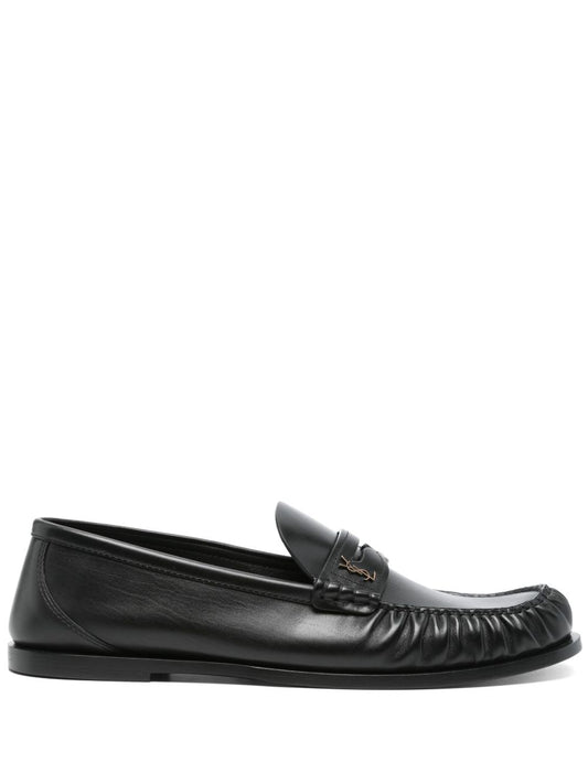 Black leather loafers